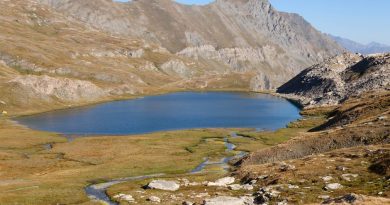 Scenic view of Lac Mézan surrounded by mountains in Provence-Alpes-Côte d'Azur, France.